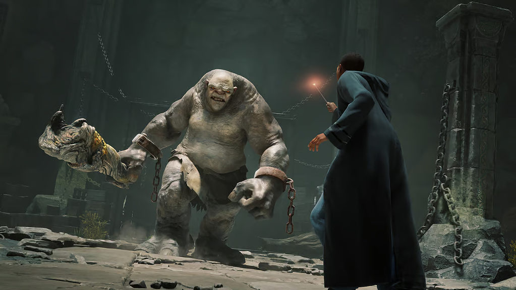 Gameplay of the hero confronting a massive troll wielding a club in a dungeon. 